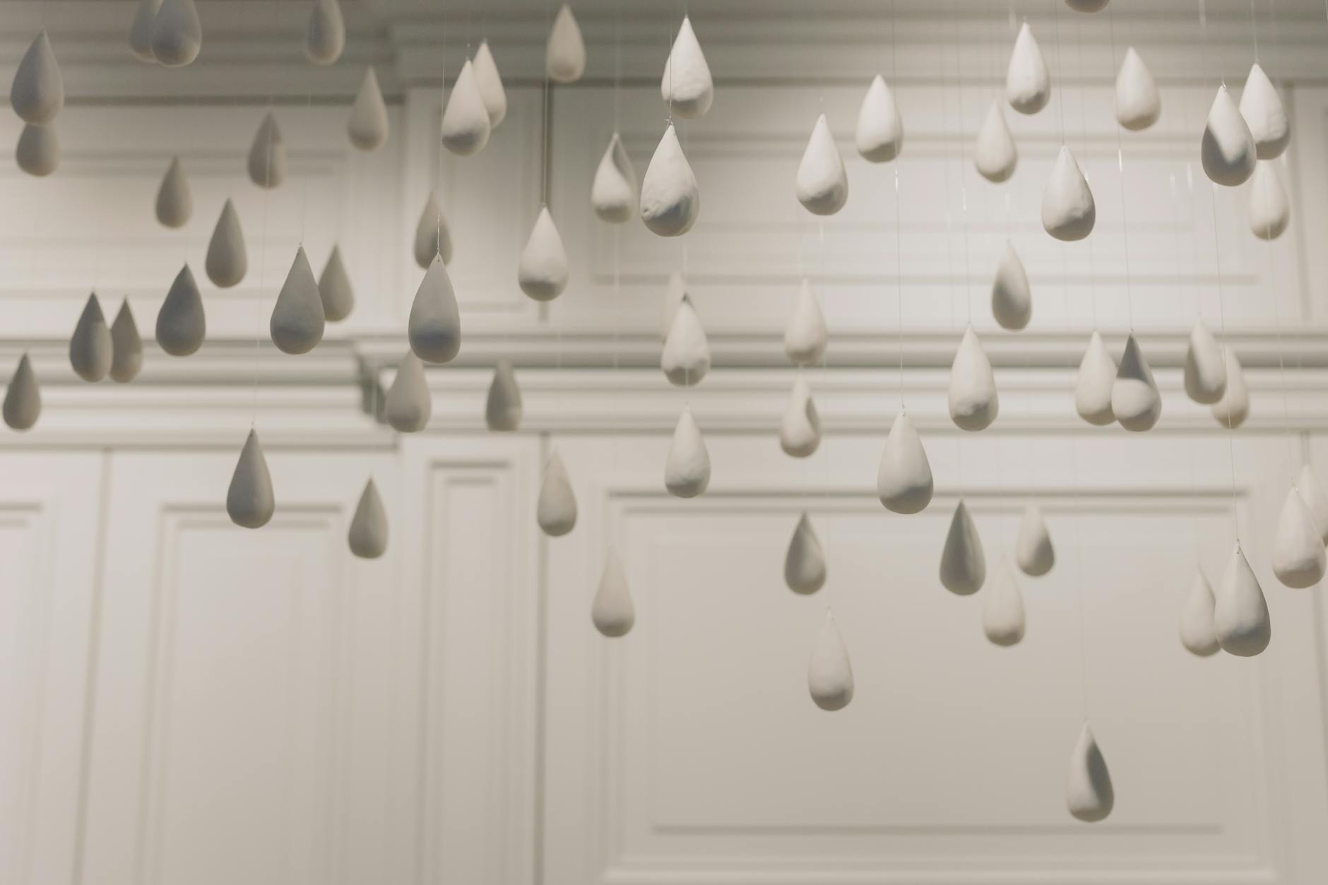 white tears hanging in air